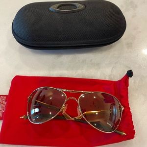 Women’s Gold Oakley Sunglasses